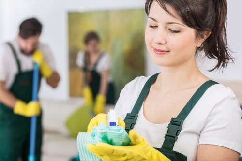 Team cleaning dust and residue after renovation work in Soho